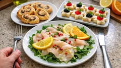 Tris di antipasti di pesce per Natale: ventagli di sfoglia, tartine e carpaccio