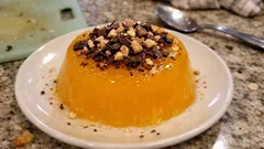 Gelo di mandarino vellutato: il dolce al cucchiaio senza forno con cioccolato e nocciole